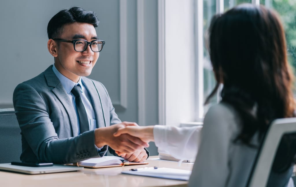 asian male director is interviewing recruit new employees 1 1024x647 1